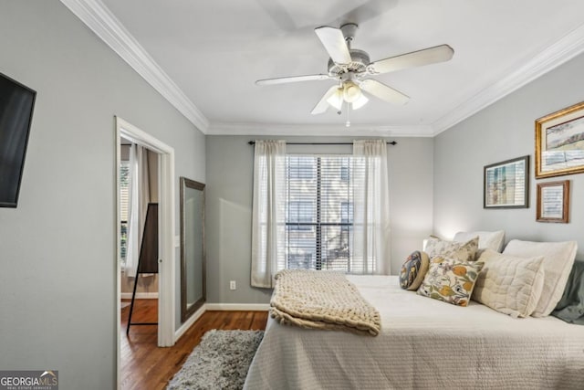 3777 Peachtree Rd NE Unit 1216, Atlanta, GA 30319 - bedroom featuring multiple windows, crown molding, wood finished floors, and ceiling fan