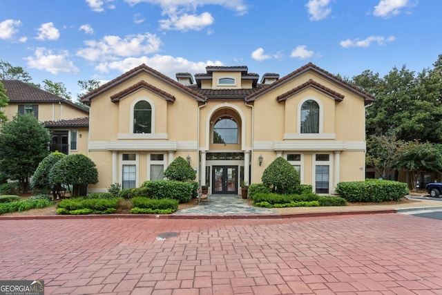 3777 Peachtree Rd NE Unit 1216, Atlanta, GA 30319 - mediterranean / spanish house with french doors, stucco siding, and a tiled roof