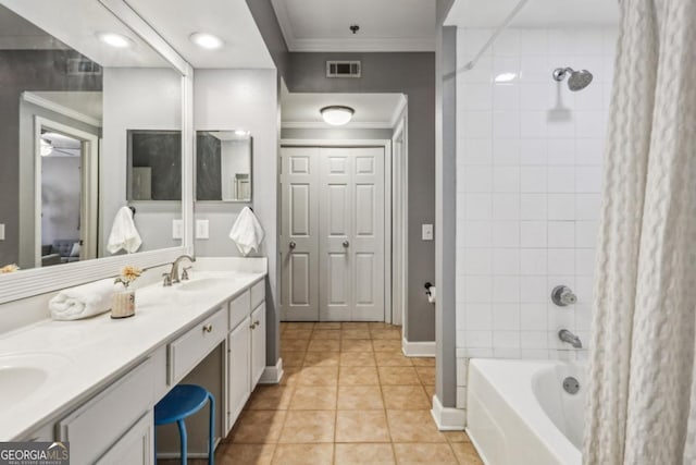 3777 Peachtree Rd NE Unit 1216, Atlanta, GA 30319 - full bathroom with ornamental molding, double vanity, shower / bath combo with shower curtain, tile patterned flooring, and a ceiling fan