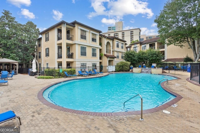 3777 Peachtree Rd NE Unit 1216, Atlanta, GA 30319 - community pool with a gazebo and a patio area