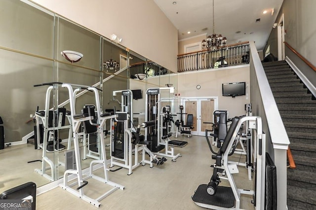 3777 Peachtree Rd NE Unit 1216, Atlanta, GA 30319 - gym with a high ceiling, a chandelier, and recessed lighting