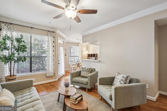 3777 Peachtree Rd NE Unit 1216, Atlanta, GA 30319 - living room with ornamental molding, ceiling fan, and wood finished floors