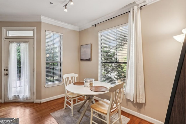 3777 Peachtree Rd NE Unit 1216, Atlanta, GA 30319 - dining space with wood finished floors and ornamental molding