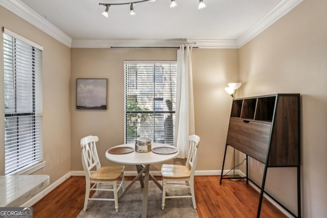 3777 Peachtree Rd NE Unit 1216, Atlanta, GA 30319 - dining room featuring wood finished floors and crown molding