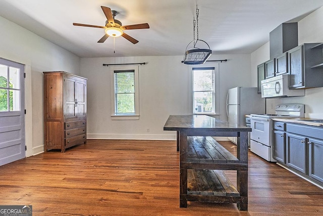 242 Hydrolia, Macon, GA 31217 - kitchen featuring white appliances, healthy amount of natural light, a ceiling fan, and dark wood finished floors
