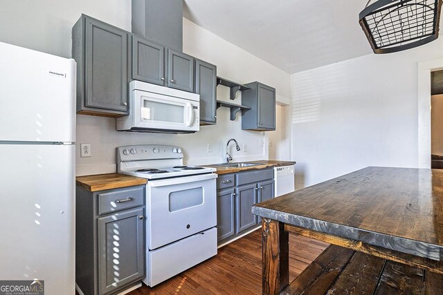 242 Hydrolia, Macon, GA 31217 - kitchen with white appliances, wood counters, dark wood-style flooring, gray cabinetry, and open shelves