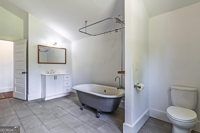 242 Hydrolia, Macon, GA 31217 - full bathroom with a freestanding bath, vaulted ceiling, and vanity