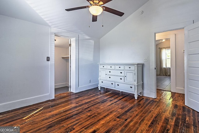 242 Hydrolia, Macon, GA 31217 - unfurnished bedroom with vaulted ceiling, dark wood finished floors, a spacious closet, a ceiling fan, and a closet