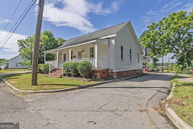 242 Hydrolia, Macon, GA 31217 - view of front of property featuring covered porch and crawl space
