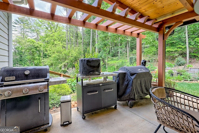 533 Ledford Rd, Dillard, GA 30537 - view of patio featuring area for grilling, a pergola, and a view of trees