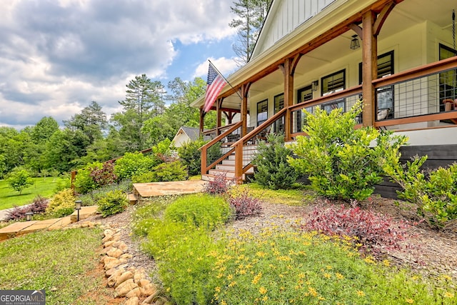533 Ledford Rd, Dillard, GA 30537 - view of yard featuring covered porch and stairway
