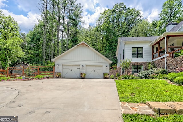 533 Ledford Rd, Dillard, GA 30537 - view of front facade with an outdoor structure, a detached garage, and stone siding