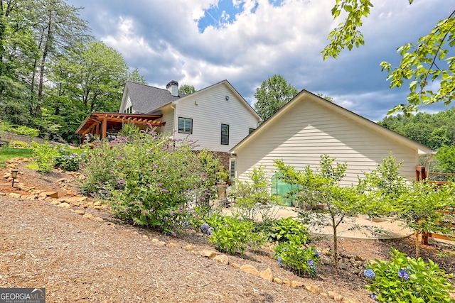 533 Ledford Rd, Dillard, GA 30537 - view of side of home with a chimney