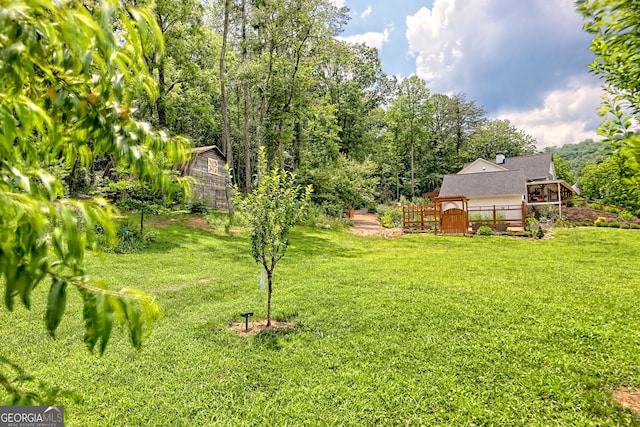533 Ledford Rd, Dillard, GA 30537 - view of green lawn with a deck