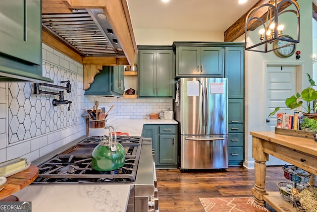 533 Ledford Rd, Dillard, GA 30537 - kitchen featuring appliances with stainless steel finishes, green cabinets, light countertops, dark wood-type flooring, and backsplash