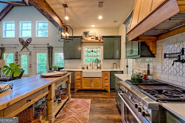 533 Ledford Rd, Dillard, GA 30537 - kitchen with high end stainless steel range oven, custom range hood, light countertops, dark wood finished floors, and recessed lighting