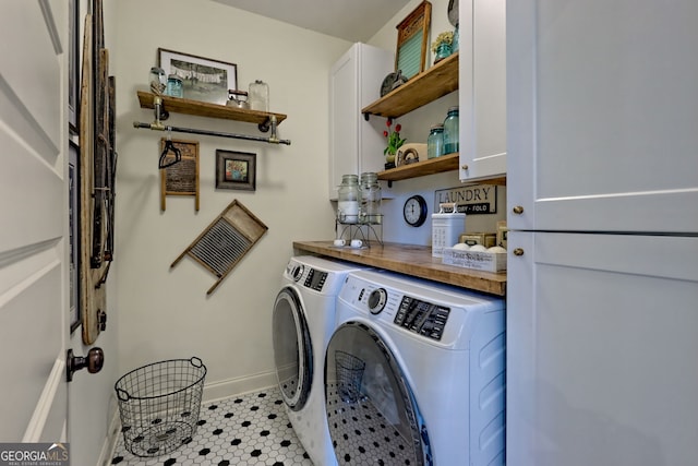533 Ledford Rd, Dillard, GA 30537 - washroom featuring cabinet space, washer and dryer, and light tile patterned floors