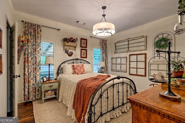 533 Ledford Rd, Dillard, GA 30537 - bedroom featuring multiple windows and wood finished floors