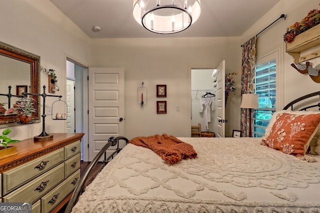 533 Ledford Rd, Dillard, GA 30537 - bedroom with a chandelier and dark wood-type flooring