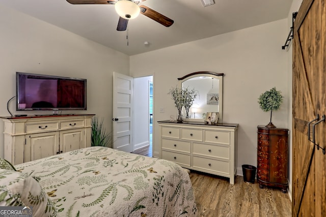 533 Ledford Rd, Dillard, GA 30537 - bedroom with wood finished floors and ceiling fan