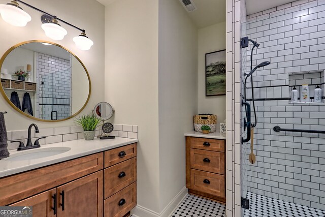533 Ledford Rd, Dillard, GA 30537 - bathroom featuring vanity, a shower stall, and tasteful backsplash