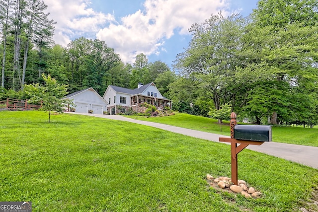533 Ledford Rd, Dillard, GA 30537 - view of front of house featuring a garage and a chimney