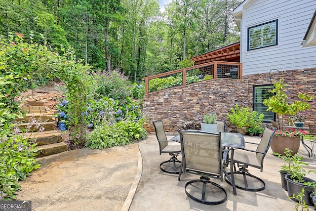 533 Ledford Rd, Dillard, GA 30537 - view of patio / terrace featuring outdoor dining area and stairway