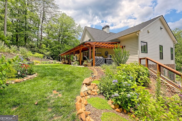 533 Ledford Rd, Dillard, GA 30537 - view of side of property featuring a chimney, a yard, and a shingled roof