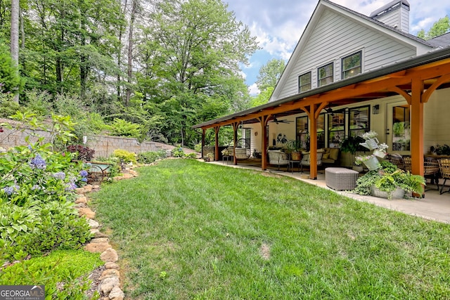 533 Ledford Rd, Dillard, GA 30537 - view of yard featuring ceiling fan, a patio, and an outdoor hangout area