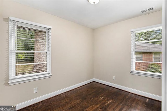 1856 Austell, Marietta, GA 30060 - empty room with baseboards and dark wood-style flooring