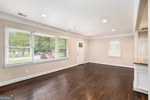 1856 Austell, Marietta, GA 30060 - unfurnished living room featuring crown molding, dark wood-style floors, healthy amount of natural light, and recessed lighting