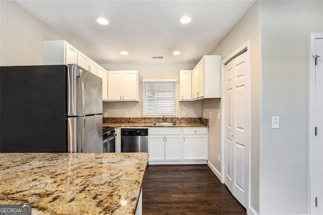 1856 Austell, Marietta, GA 30060 - kitchen with stainless steel appliances, light stone counters, white cabinets, and recessed lighting