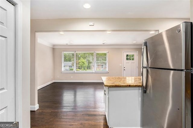 1856 Austell, Marietta, GA 30060 - kitchen with freestanding refrigerator, crown molding, dark wood-style floors, light stone countertops, and recessed lighting