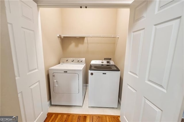 845 Darby Rd, Waleska, GA 30183 - washroom with washing machine and dryer and light wood-style floors