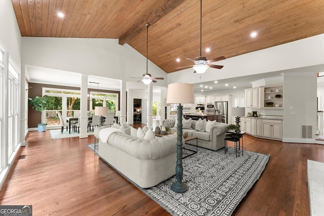 5455 Malone Ct, Powder Springs, GA 30127 - living area with a ceiling fan, dark wood-type flooring, high vaulted ceiling, healthy amount of natural light, and a wooden ceiling with exposed beams