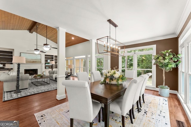 5455 Malone Ct, Powder Springs, GA 30127 - dining area featuring ceiling fan, wood finished floors, wooden ceiling, a fireplace, and a chandelier