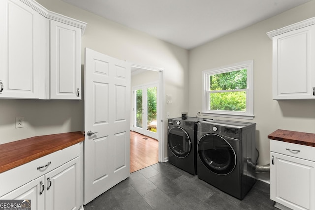 5455 Malone Ct, Powder Springs, GA 30127 - laundry room with cabinet space and washer and dryer