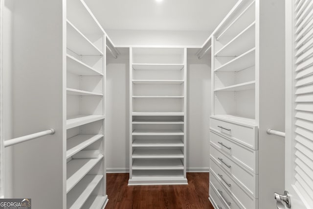 5455 Malone Ct, Powder Springs, GA 30127 - spacious closet with dark wood-style flooring