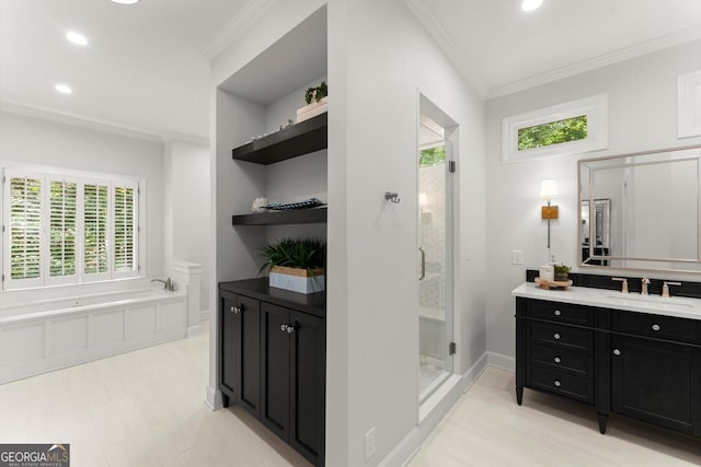 5455 Malone Ct, Powder Springs, GA 30127 - full bathroom featuring vanity, ornamental molding, a shower stall, recessed lighting, and a garden tub