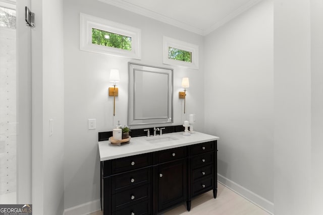 5455 Malone Ct, Powder Springs, GA 30127 - bathroom with vanity, crown molding, and wood finished floors
