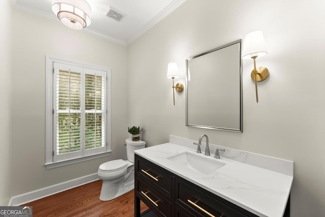 5455 Malone Ct, Powder Springs, GA 30127 - half bathroom with ornamental molding, vanity, and wood finished floors