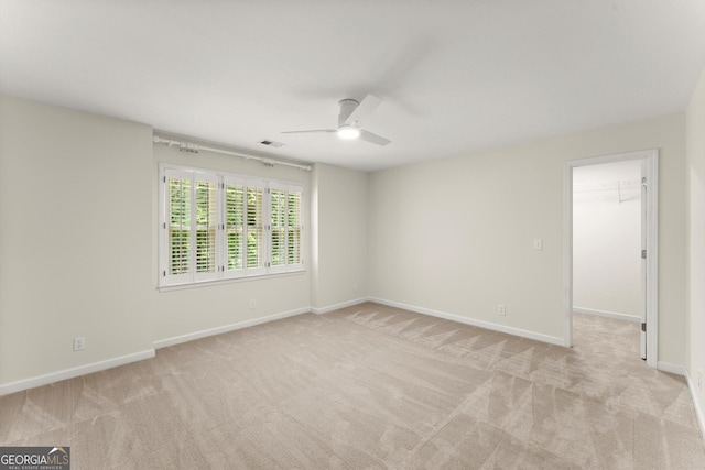 5455 Malone Ct, Powder Springs, GA 30127 - unfurnished room with light colored carpet and a ceiling fan