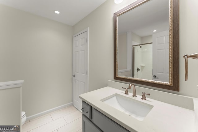 5455 Malone Ct, Powder Springs, GA 30127 - bathroom featuring vanity, a shower with door, tile patterned floors, and recessed lighting