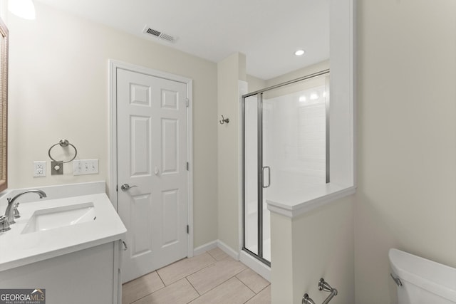 5455 Malone Ct, Powder Springs, GA 30127 - bathroom with a stall shower, vanity, tile patterned flooring, and recessed lighting