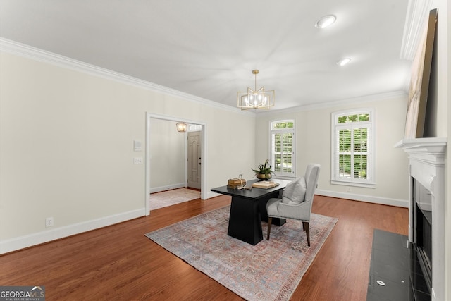 5455 Malone Ct, Powder Springs, GA 30127 - dining room featuring crown molding, a chandelier, dark wood finished floors, and a fireplace with flush hearth