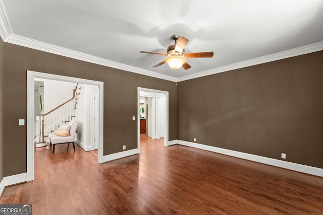 5455 Malone Ct, Powder Springs, GA 30127 - spare room with ceiling fan, crown molding, and wood finished floors