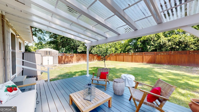 1437 18th St, Columbus, GA 31901 - deck featuring a storage shed, a fenced backyard, and a pergola