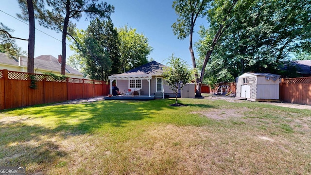1437 18th St, Columbus, GA 31901 - fenced backyard featuring a shed and a deck