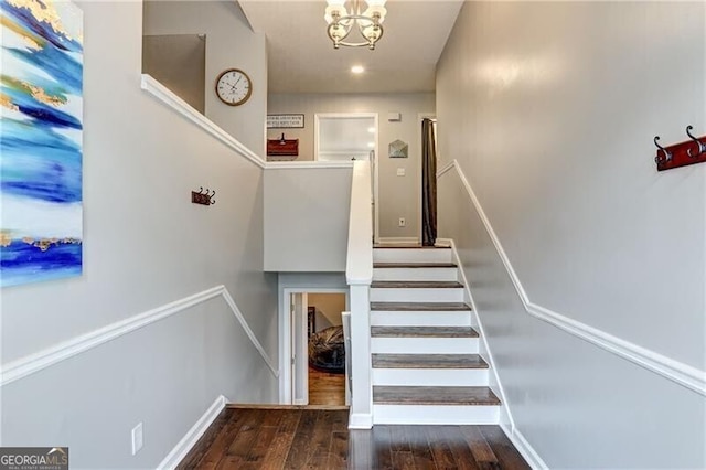 1361 Chatley Way, Woodstock, GA 30188 - staircase featuring wood finished floors and a chandelier