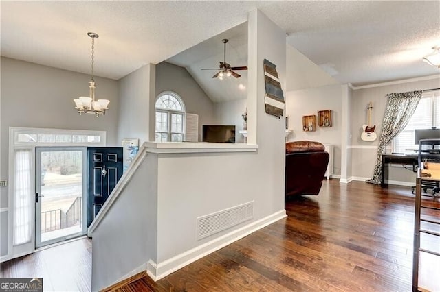 1361 Chatley Way, Woodstock, GA 30188 - foyer with a chandelier, healthy amount of natural light, wood finished floors, ceiling fan, and a textured ceiling